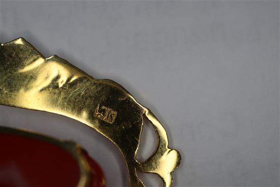 A 14k yellow metal and coral set drop pendant, 44mm.